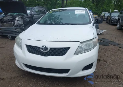 2009 Toyota Corolla from USA, damaged, VIN 1NXBU40E89Z001415